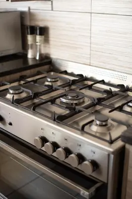 a gas stove top oven in a kitchen at The Bushveld Farmhouse in Mabalingwe Nature Reserve in Warmbaths
