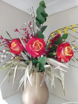 a vase with a bunch of flowers in it at Accommodation@Park1285 in Pretoria