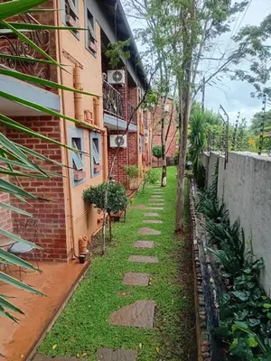 a walkway in front of a building at Claires of Centurion in Centurion