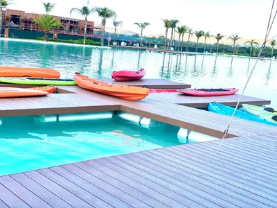 a group of boats sitting on a dock in the water at The Blyde 104 in Pretoria