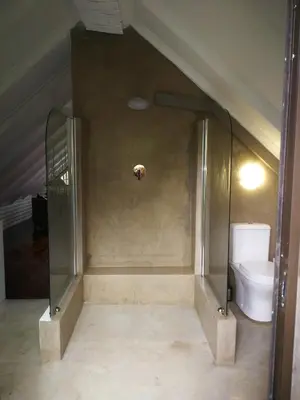 a bathroom with a toilet in a room at Kruger River Villas- Treetop Loft in Marloth Park