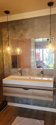 a bathroom with a large sink and a mirror at Mosswood Bed & Breakfast in Graskop
