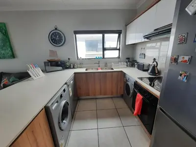 a kitchen with a sink and a dishwasher at 396 The Blyde Crystal Clear Lagoon 2 Bedroom Penthouse Apartment in Pretoria