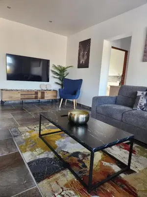 a living room with a couch and a table at 636 Itaga Safari Lodge, Mabalingwe Nature Reserve in Mabula