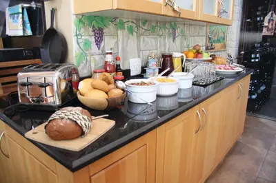 a kitchen counter with a bunch of food on it at African BnB - The Boutique Experience in Benoni