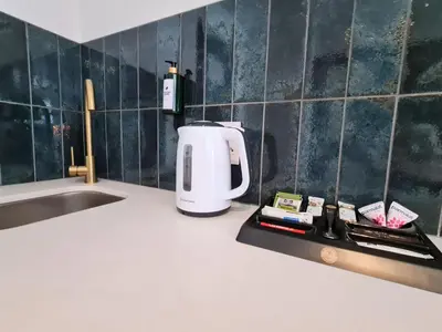 a coffee maker sitting on a counter in a kitchen at MINT Resorts The Blyde in Pretoria
