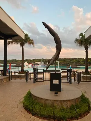 a statue of a person jumping in the air at The Blyde Magna Host Luxury Apartments in Pretoria