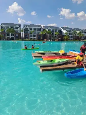 a group of kayaks on a dock in the water at The Blyde 1317 in Pretoria