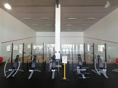 a gym with a bunch of chairs in a room at The Blyde 1317 in Pretoria