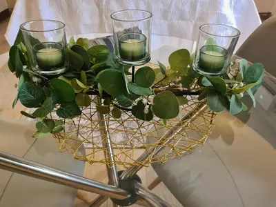 a basket with four glasses and a plant on a table at Halfway Gardens Home in Midrand