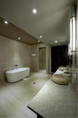 a large bathroom with a tub and a sink at Palala Boutique Game Lodge and Spa in Tom Burke