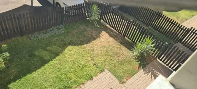 an aerial view of a fence with palm trees at Midrand Ninth on Lever Shalom in Midrand