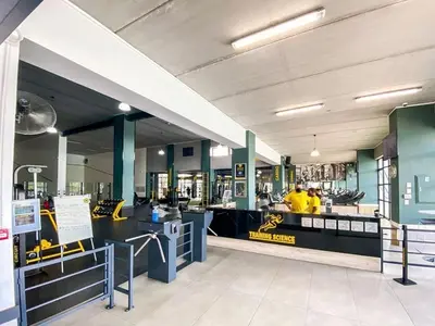 a restaurant with a counter and a food court at The Blyde in Pretoria
