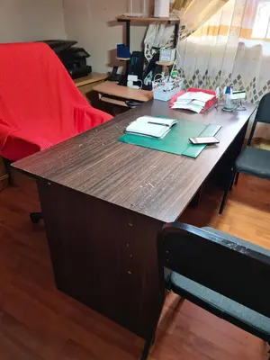 a large wooden table in a room at Baraka House in Midrand
