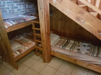 a couple of bunk beds in a room at Rainbow Lodge in Belfast