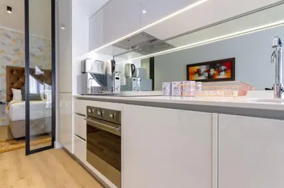 a kitchen with a sink and a counter top at Alimama Spaces: The Manson's Ellipse in Midrand