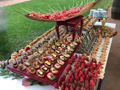 a display of different types of food on a table at Absolut Guest Boutique in Centurion