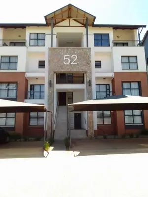 a large building with the number on it at Blyde 3 bed Lagoon View Apartment in Pretoria