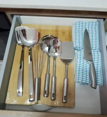 a group of utensils sitting in a drawer at Apartment 432 @ The Blyde Riverwalk Pretoria in Pretoria