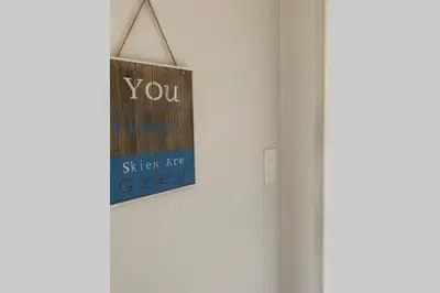 a sign that reads you harder than a stick areey hanging on a wall at Spectacular 2 bedroom Penthouse Apartment in Midrand