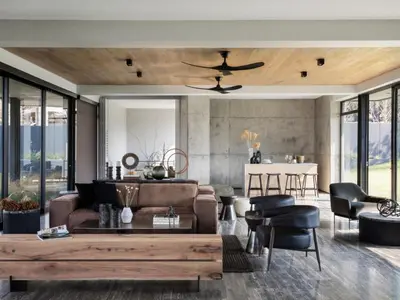a living room with a couch and a table at Askara Haus in Pretoria