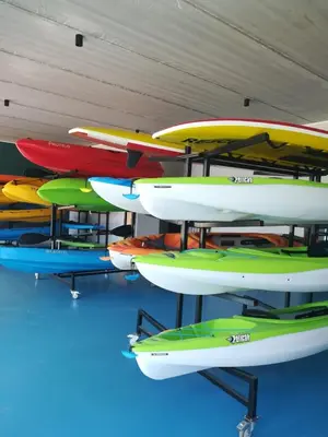 a bunch of kayaks on display in a room at The Blyde in Pretoria