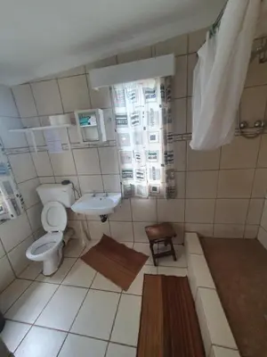 a bathroom with a toilet and a sink at Kaapsche Draai in Kaapsehoop