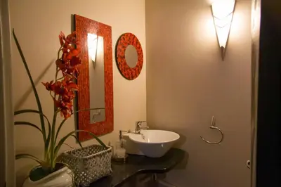 a bathroom with a sink and a mirror at Zoete Rust Boutique Hotel in Lephalale