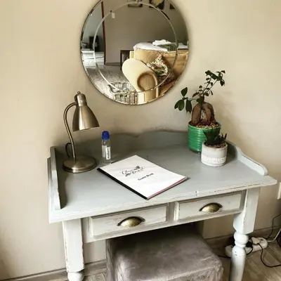 a white dressing table with a mirror on it at Olive Branch Cottage off grid in Benoni