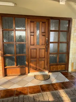 an entrance to a house with a wooden door at Cottage 32 in Groblersdal