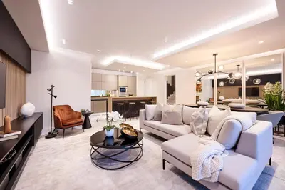 a large living room with a couch and a table at Ellipse Waterfall Executive Apartments in Midrand