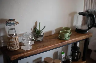 a wooden shelf with various items on it at Bronberg Bastion in Tierpoort