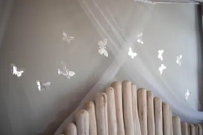 a room with butterflies on the wall at Bronberg Bastion in Tierpoort