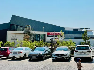a group of cars parked in a parking lot at Menlyn Maine Trilogy Hotel in Pretoria
