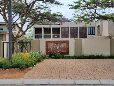 a house with graffiti on the side of it at Avonlea Guesthouse in Polokwane