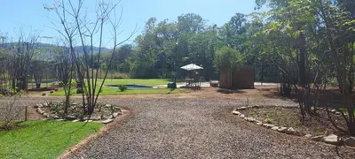 a gravel driveway with a gazebo in a park at Vulture's View 1 in Hartbeespoort