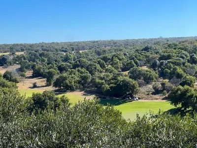 a view of a golf course from the top of a hill at Elements Private Golf Reserve Unit 149 or 150 in Bela-Bela