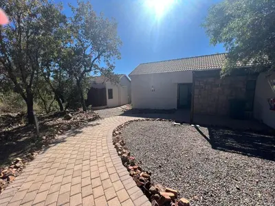 a brick walkway in front of a building at Elements Private Golf Reserve Unit 149 or 150 in Bela-Bela