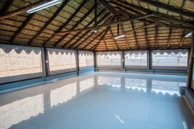 a large room with a large room with a large ceiling at President Guest Lodge in Louis Trichardt