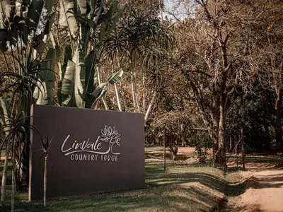 a sign for the litle crunchy house in a park at Linvale Country Lodge in Hazyview