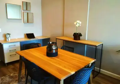 a table with a tea pot on top of it at Menlyn Apartment - Trilogy in Pretoria