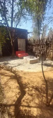 a park with a playground and a wooden fence at Vulture's View 3 in Hartbeespoort