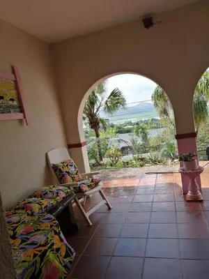 a room with a bed and a view of the ocean at THEE VIEW in Hartbeespoort
