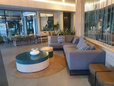 a living room with a couch and a table at Luxury 264 The Blyde in Pretoria