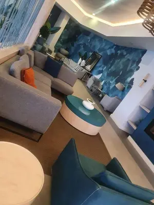 an aerial view of a living room with a couch at Luxury 264 The Blyde in Pretoria