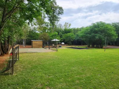 a park with a basketball court and a basketball hoop at Vulture's View 5 in Hartbeespoort