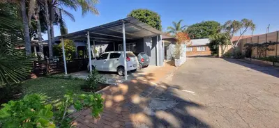 a car parked in front of a garage at 7-on-Burger in Polokwane