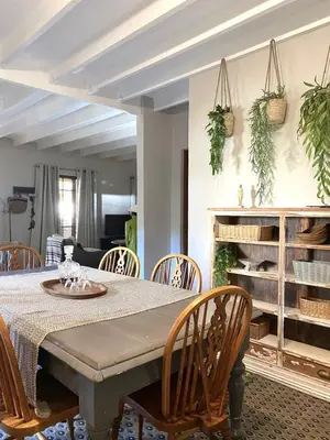 a dining room with a table and chairs at Fairstreams 4 in Dullstroom