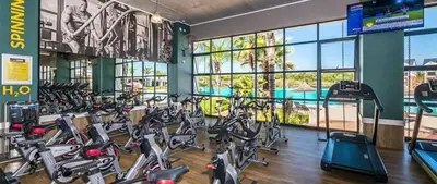 a gym with a bunch of bikes in a room at THE BLYDE LAGOON BEACH PRETORIA 3 BEDROOM GROUND FLOOR APARTMENT in Pretoria