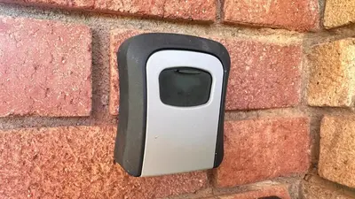 a soap dispenser on a brick wall at White River Selfcatering at Greenway woods House no 9 in White River